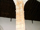 a combination of the nature of the stone, the damp, and exposure to salt in the air