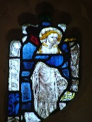 St Catherine with an angel's head
