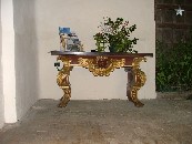 fine table (bolted to the wall and floor)