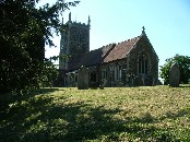 on its mound at the heart of the village