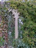 Curious window tracery in south wall. It appears Victorian...