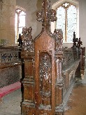 St Philip holds three loaves inthe niche; the sin above is Lust