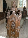 a Prophet and two figures in Tudor dress