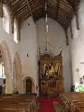 west end, with curious internal stair turret and barrel organ