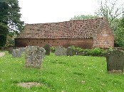 barn on the edge of the graveyard