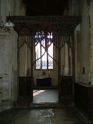 view through the screen into the south aisle chapel