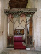 view through the screen into the north aisle chapel
